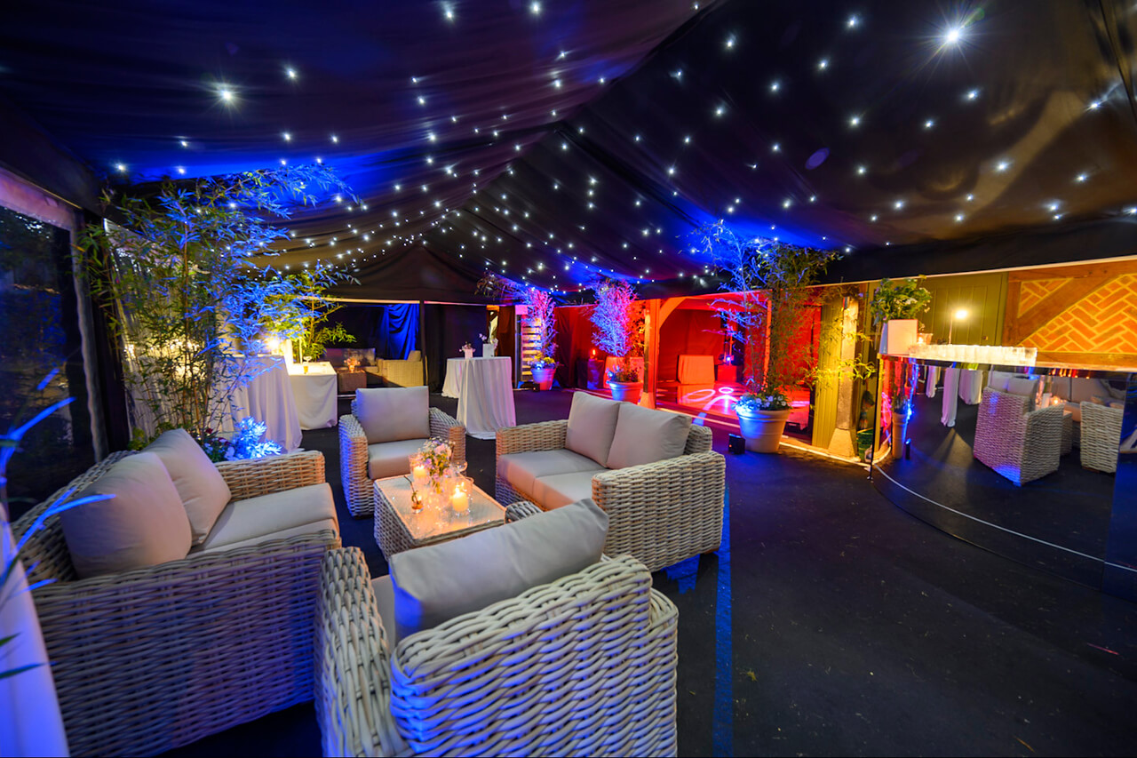 Disco party at night in a marquee breakout room