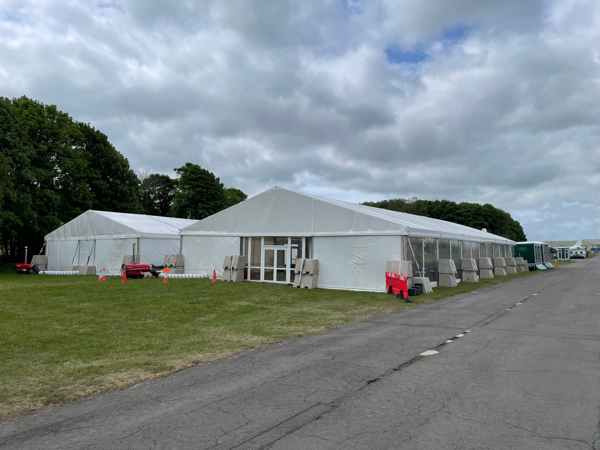 Two large white marquees